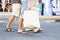 Pedestrians in a Italian city walking in a stone street