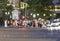 pedestrians wait at the Strip in Las Vegas for green light to cross the street