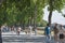 Pedestrians walk over the ancient fortified walls in Lucca, Tusc