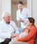 Pediatrician doctor examining newborn baby