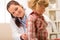 Pediatrician examine child girl with stethoscope