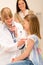 Pediatrician examine girl chest with stethoscope