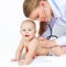 Pediatrician listening baby heart
