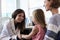 Pediatrician Meeting With Mother And Child In Hospital