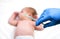 Pediatrician vaccinating newborn baby. Vaccine, Vaccination for infant child Soft focus Syringe in hands of a nurse and blurred