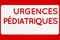 Pediatrics emergency sign on a wall called urgences pediatriques in French