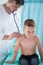 Pediatrist makes auscultation