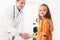 Pediatrist in white coat and child shaking hands