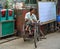 Pedicab driver on street