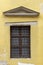 Pediment above a window of an ancient european house.