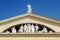 Pediment with sculptures of people from Stalin\'s empire