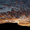 Pedra Branca neighborhood, Palhoca, Brazil with silhouette of the hill, sky at sunset with colorful clouds, infinity of colors in