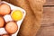 Peel eggs on a wooden board and hessian