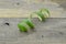 Peel fresh lemons on wooden background, decorate