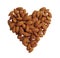 Peeled almonds closeup heart shape