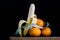 Peeled banana and measure tailor on an old kitchen table. Fruit