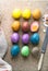 Peeled Colorful Easter eggs background, top view.