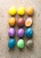 Peeled Colorful Easter eggs background, top view.