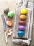 Peeled Colorful Easter eggs background, top view.