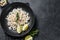 Peeled cooked Shrimps, Prawns in a plate. Black background. top view. copy space