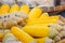 Peeled Freshly Steamed Sweet Corn in the Food Market