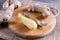 Peeled ginger root on a cutting board