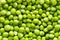 Peeled green pea background. Heap of fresh beans ready to eat.