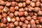 Peeled hazelnuts, cobnuts background