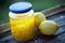 Peeled lemons and lemon peels in a jar lemoncello