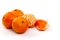 Peeled mandarin tangerine clementine segments  on white background