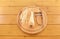 Peeled parsnip with vegetable peeler on a chopping board