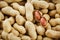 Peeled peanut on well peanuts. Peanuts, for background or textures.