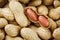 Peeled peanut on well peanuts. Peanuts, for background or textures.