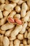 Peeled peanut on well peanuts. Peanuts, for background or textures.