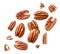Peeled pecans with broken halves and pieces on a white background. The view from top