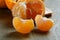 Peeled tangerines with slices