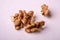 Peeled walnuts heap food on white background