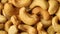 Peeled whole cashew nuts full frame close up