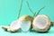 Peeled young coconut fruit and glass of coconut water