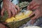 Peeling organic rare Durian by chef`s hands at freshness Fruit vendor shop, homemade design gourmet, advertisement