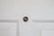 Peephole/eye hole at white wooden door