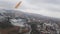 A Pegasus airline plane comes in for landing in Istanbul above the clouds at high altitude close up