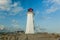 Peggy\\\'s Cove Lighthouse Atlantic Coast Nova Scotia Canada. Beautiful summer afternoon.