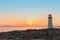Peggys Cove\'s Lighthouse at Sunset