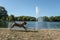 Peissnitz public park fountain in the city of Halle Saale, Germany with a Shar Pei dog flying in the foreground
