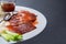 Peking Duck - Chinese roast duck served with cucumber, spring on