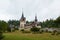 Peles Castle, residence of King Charles I in Sinaia, Romania. Autumn landscape, royal palace and park