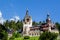 Peles Castle in Sinaia, Romania on a beautiful summer day