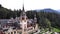 Peles castle. Sinaia, Romania. The castle is surrounded by beautiful carpathian mountains.