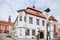 Pelhrimov, Czech Republic, 03 July 2021: renaissance historic building Srejnar House and castle with red facade, mansard roof with